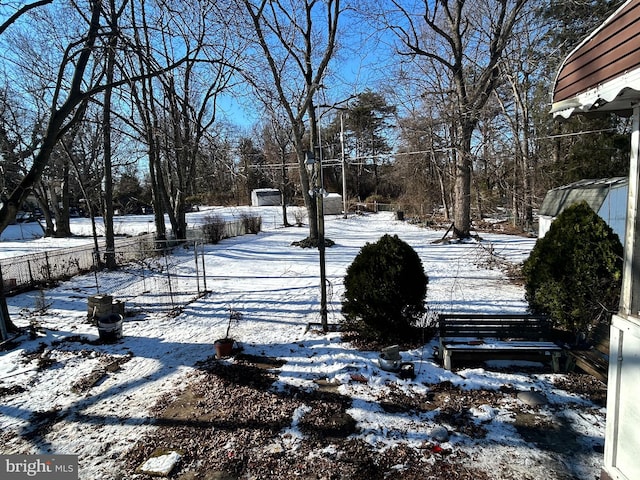 view of yard covered in snow