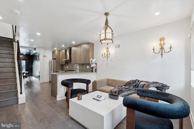 living room with dark hardwood / wood-style floors