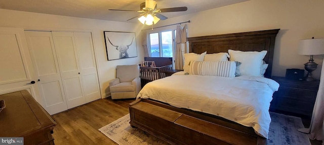 bedroom featuring ceiling fan, a closet, and light hardwood / wood-style flooring