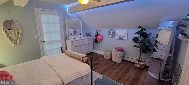 bedroom featuring hardwood / wood-style flooring, ceiling fan, lofted ceiling, and baseboard heating