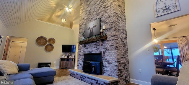 living room featuring hardwood / wood-style flooring, high vaulted ceiling, and wooden ceiling