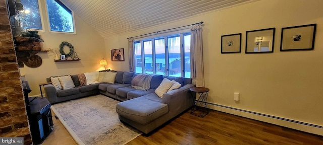 living room with lofted ceiling, hardwood / wood-style floors, and baseboard heating