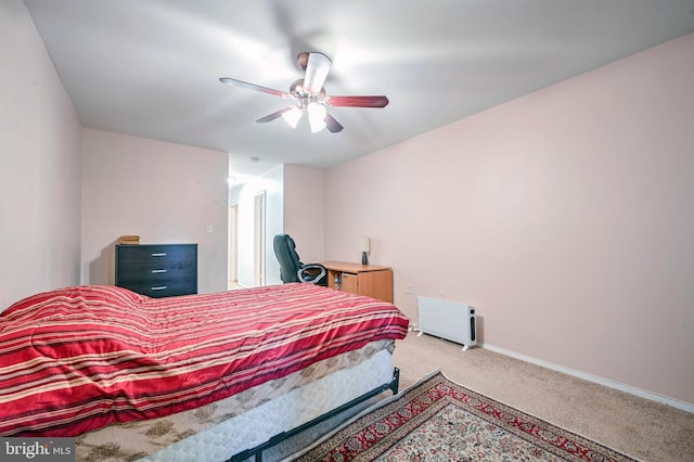 bedroom with ceiling fan and carpet