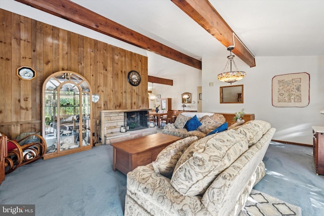 carpeted living room featuring vaulted ceiling with beams and wood walls