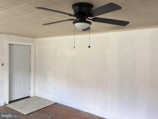 empty room featuring ceiling fan and wood-type flooring