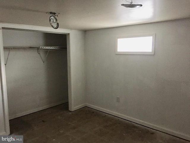 unfurnished bedroom featuring a closet