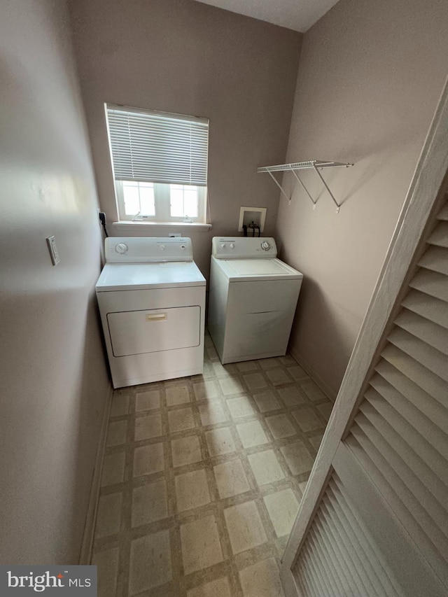 laundry room featuring independent washer and dryer