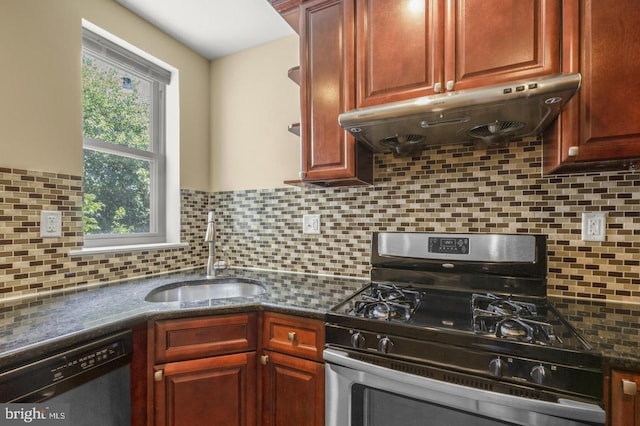 kitchen featuring sink, decorative backsplash, a wealth of natural light, and appliances with stainless steel finishes