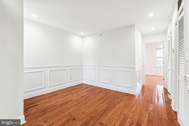 empty room featuring hardwood / wood-style flooring