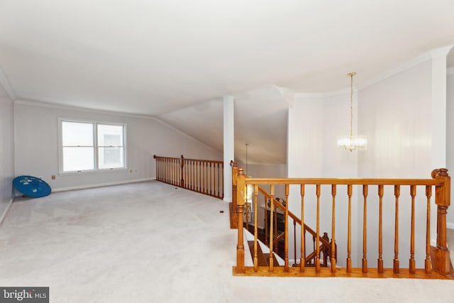 bonus room featuring light carpet, lofted ceiling, and a chandelier