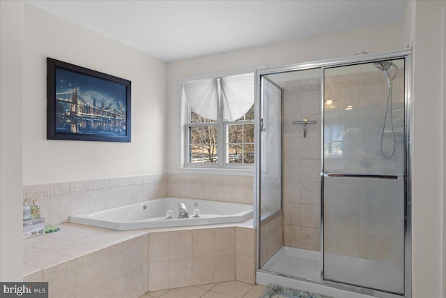 bathroom featuring separate shower and tub and tile patterned floors