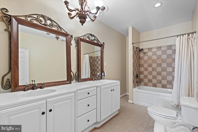 full bathroom with toilet, shower / bath combo with shower curtain, a chandelier, tile patterned floors, and vanity