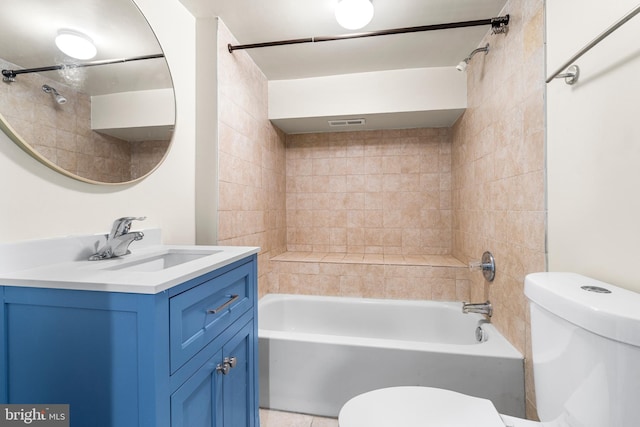 bathroom with toilet, shower / bath combination, visible vents, and vanity