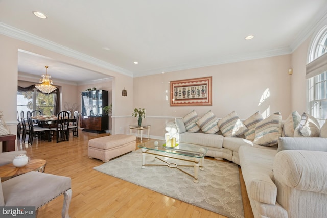 living room featuring crown molding and wood-type flooring