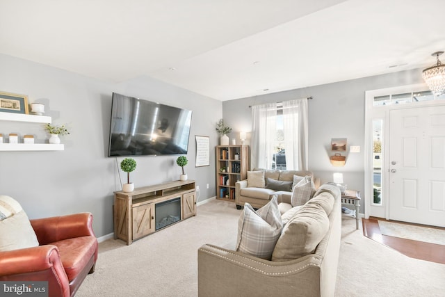 living room featuring light carpet