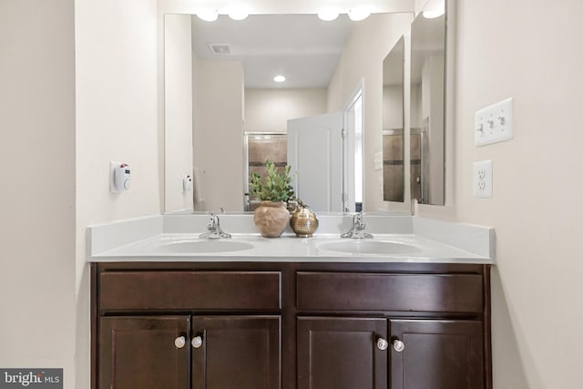 bathroom featuring vanity and walk in shower