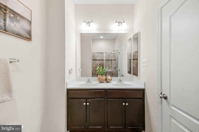 bathroom with vanity and an enclosed shower