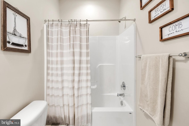 bathroom featuring shower / bath combination with curtain