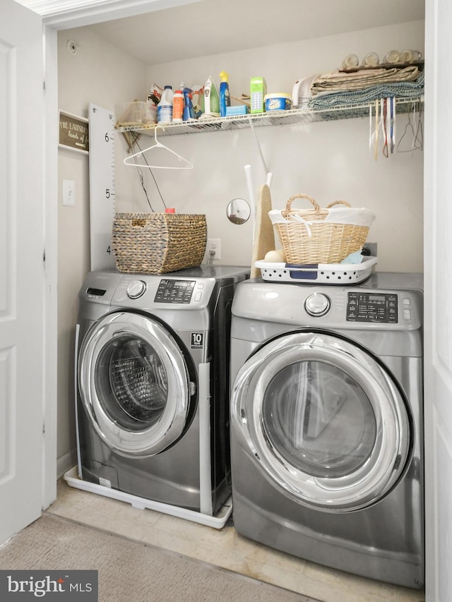 laundry area featuring washer and dryer