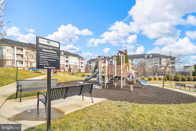 view of playground with a yard