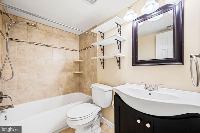 full bathroom with tiled shower / bath combo, vanity, tile patterned flooring, and toilet