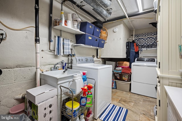 laundry room with separate washer and dryer