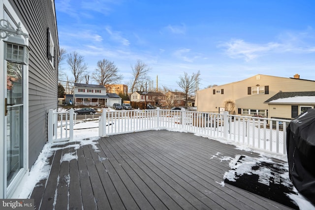 view of snow covered deck