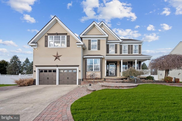 view of front of house with a garage, a porch, and a front lawn