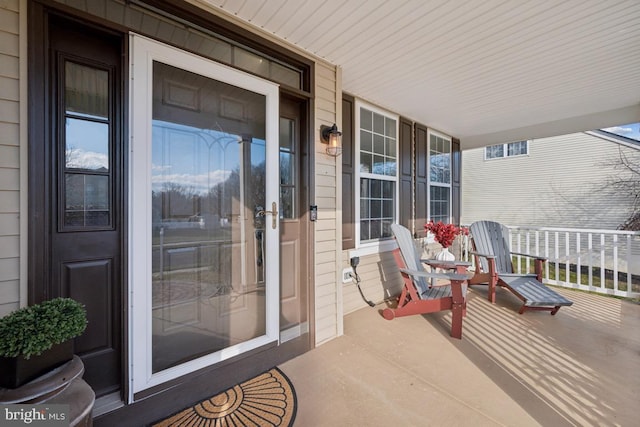 entrance to property with a porch