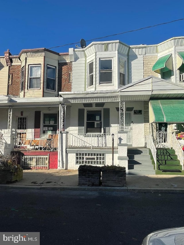 multi unit property featuring covered porch