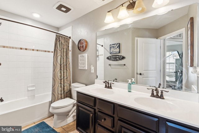 full bathroom with tile patterned flooring, vanity, toilet, and shower / bath combo