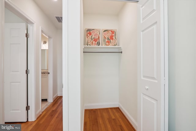 hallway featuring light wood-type flooring