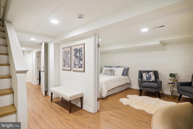 bedroom with light wood-type flooring