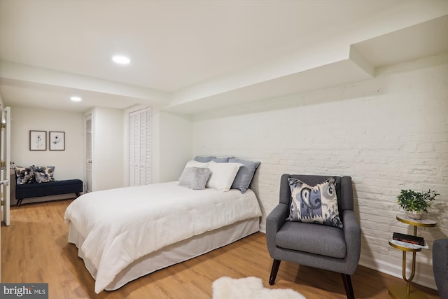 bedroom featuring hardwood / wood-style flooring