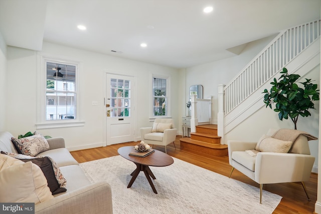 living room with light hardwood / wood-style flooring