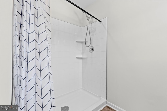 bathroom featuring walk in shower