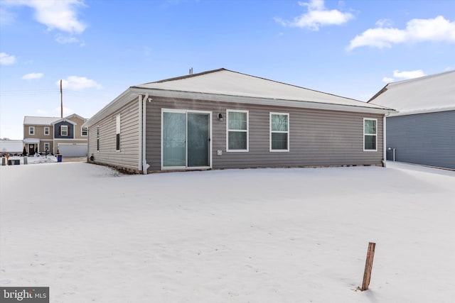 view of snow covered property