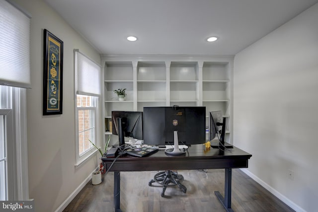 office area featuring dark wood-type flooring