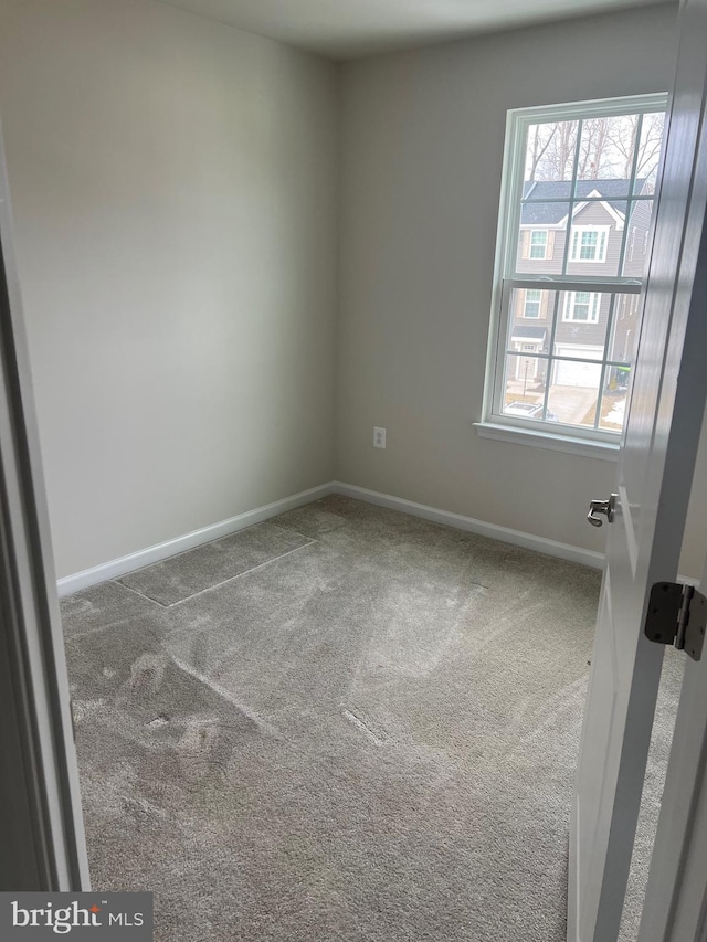 view of carpeted spare room