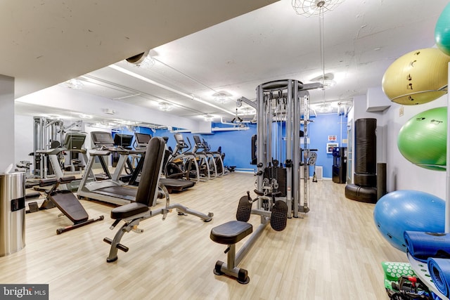 gym with hardwood / wood-style floors