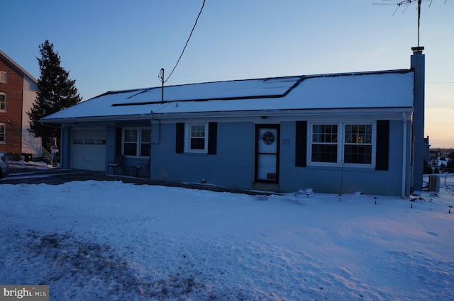 view of front of property featuring a garage