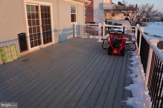 view of snow covered deck