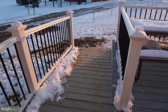 view of snow covered deck