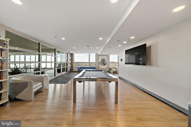 recreation room featuring baseboards, pool table, expansive windows, light wood-style floors, and recessed lighting