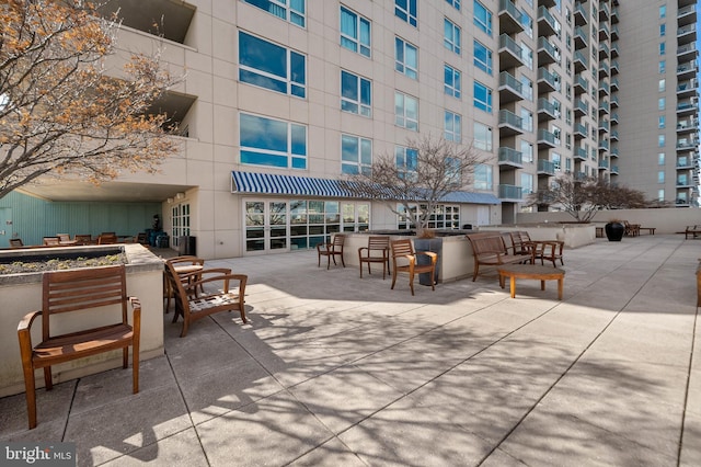 view of home's community featuring a patio area