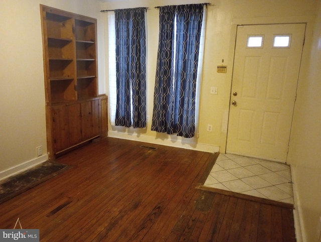 foyer with hardwood / wood-style floors