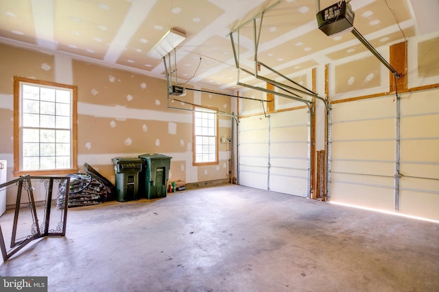 garage featuring a garage door opener