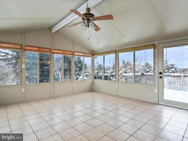 unfurnished sunroom with vaulted ceiling with beams and ceiling fan