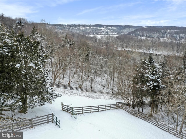 exterior space with a view of trees