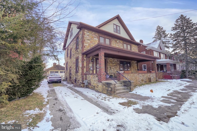 view of front of property featuring covered porch